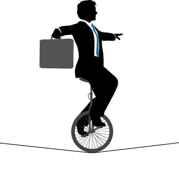 4072378_business-man-unicycle-tightrope-over-financial-risk - cropped-sm